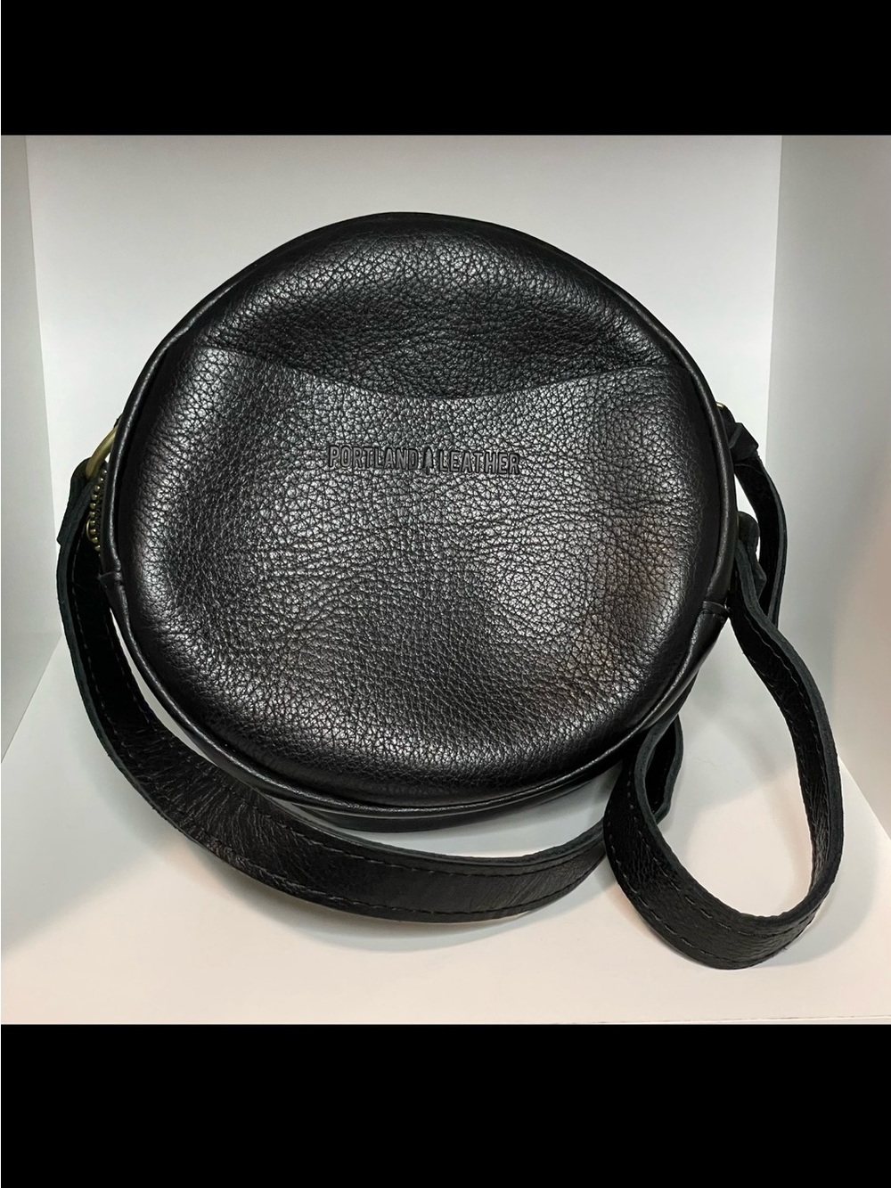 PLG Small Circle Crossbody Bag — Pebbled Black